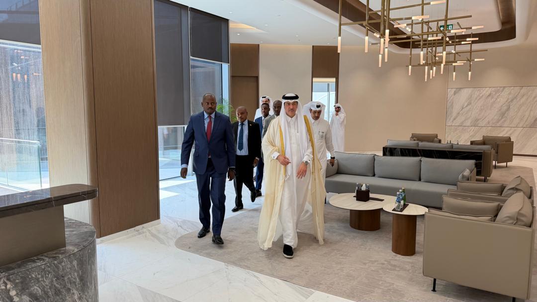 H.E. Dr. Ahmed bin Mohammed Al-Sayed, Qatar’s Minister of State for Foreign Trade Affairs (right), walks with Uganda’s Acting Foreign Affairs Minister, Hon. Haruna Kasolo Kyeyune, during their engagement in Doha. In the background is Uganda’s Special Presidential Envoy to Qatar, H.E. Amb. Dr. Rashid Yahya Ssemuddu.